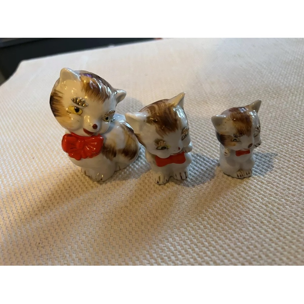 Vintage Porcelain Cat Figurines With Gold Eyebrows and Red Bow set of three EUC